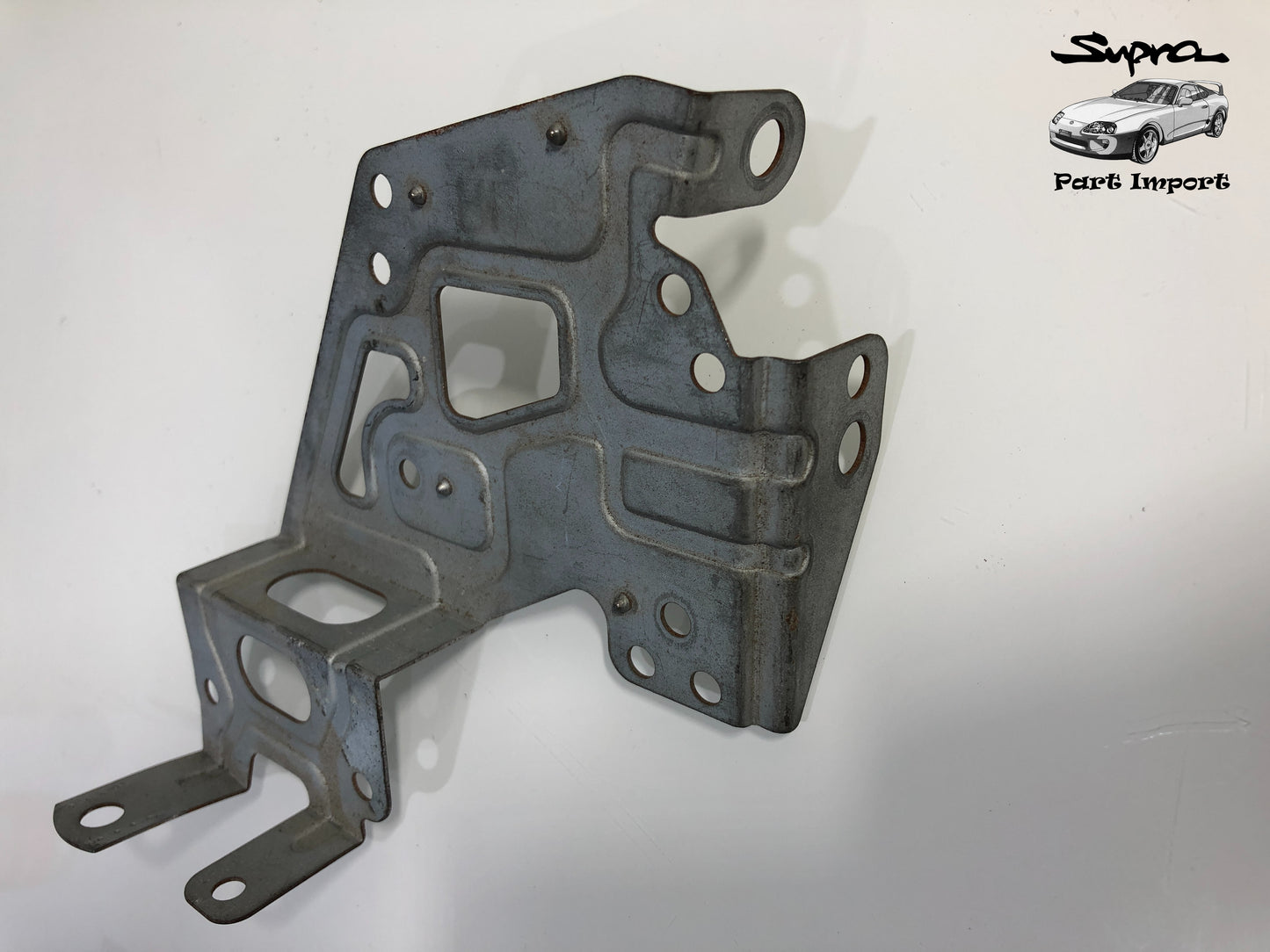 JZA80 Supra S1/S2 RHD OEM Radio Bracket Set (2 pc.) (86212-14210 + 86211-14250)