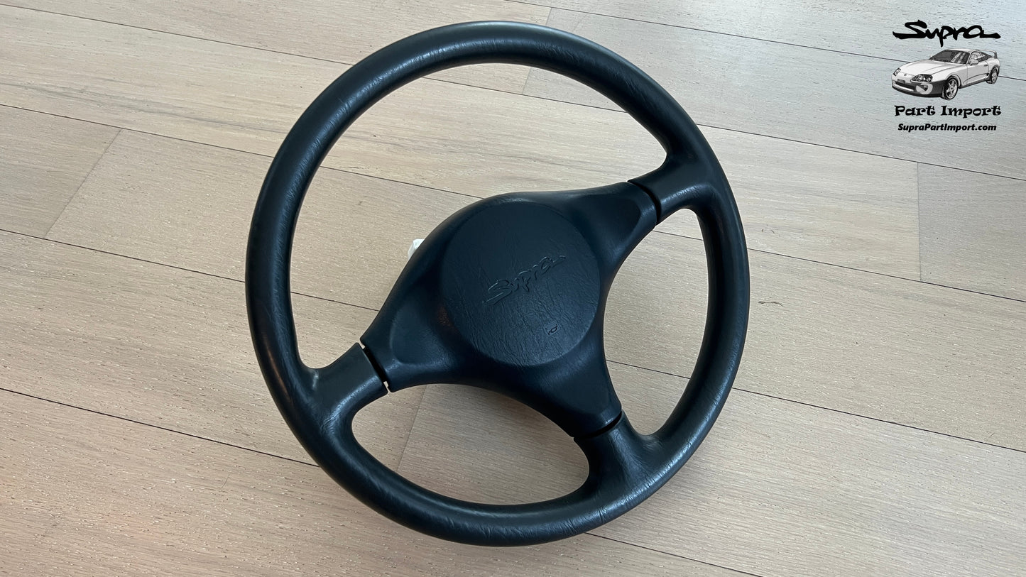 JZA80 Supra Genuine OEM S1 "Supra" Script Steering Wheel