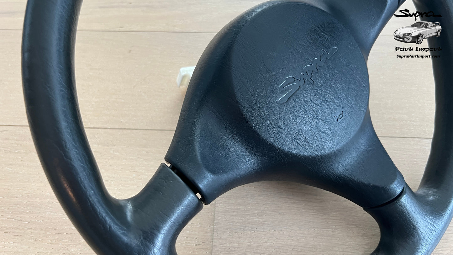 JZA80 Supra Genuine OEM S1 "Supra" Script Steering Wheel