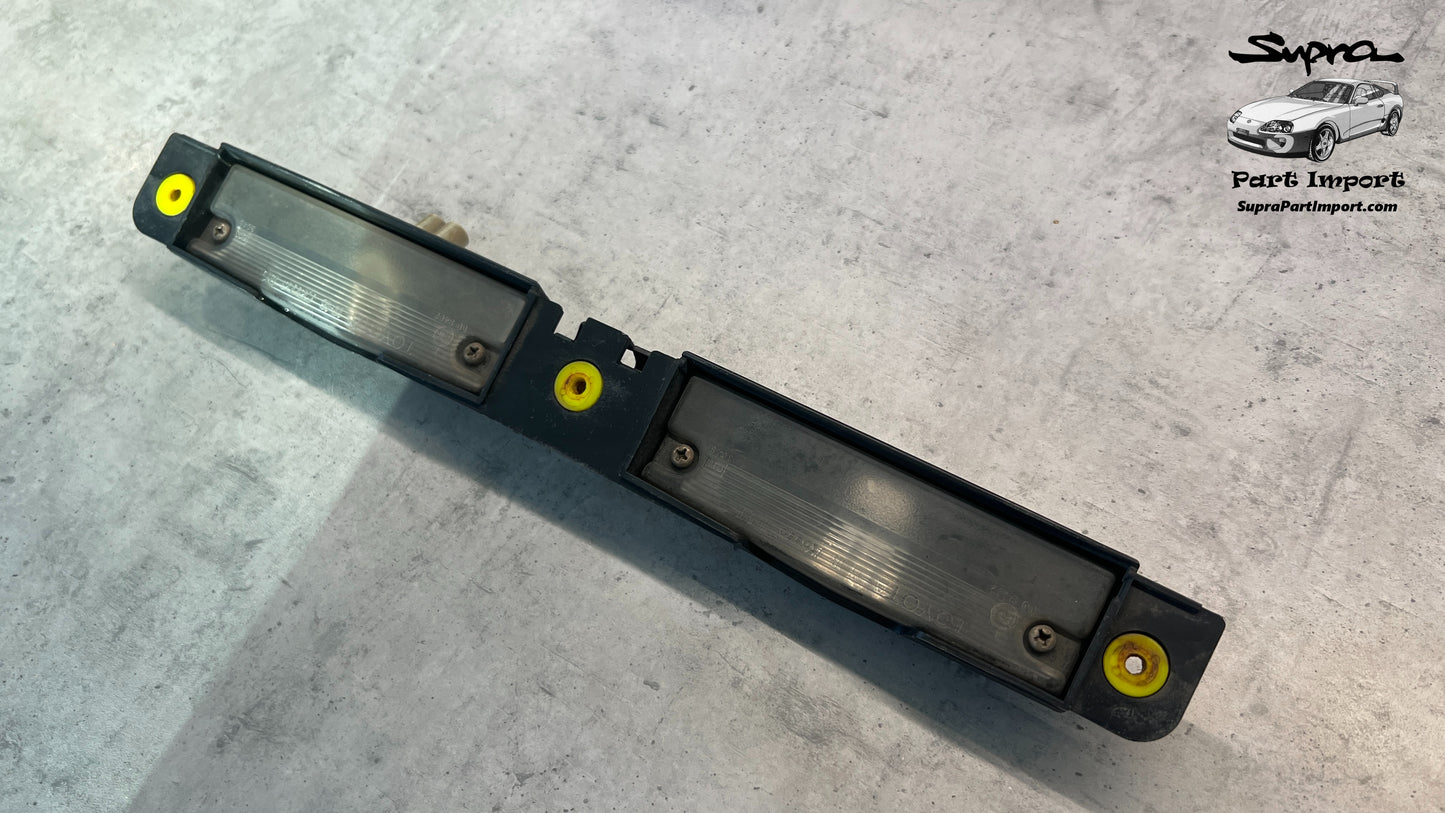 JZA80 Supra Genuine OEM Rear Bumper Licence Plate Light Base (81270-24030)