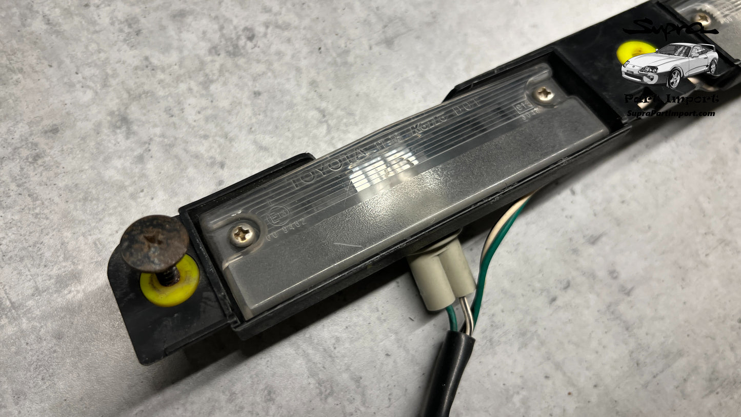 JZA80 Supra Genuine OEM Rear Bumper Licence Plate Light Assembly (81270-24030)