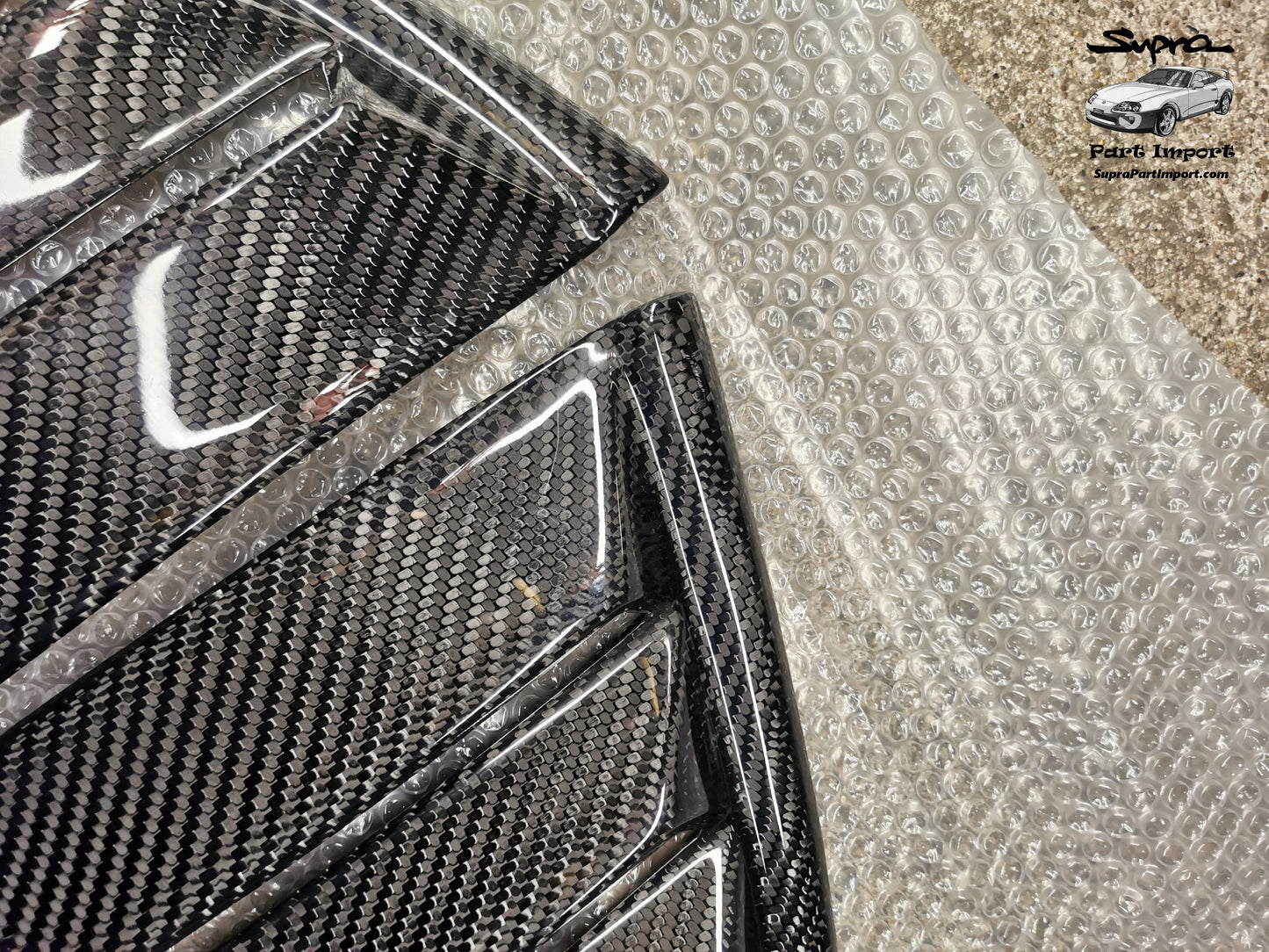 JZA80 Supra Aftermarket N1Composites Gloss 2x2 Carbon Fiber Rear Quarter Window Louvers