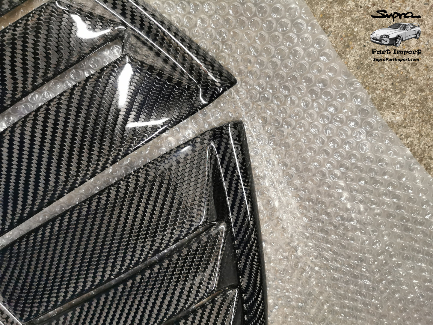 JZA80 Supra Aftermarket N1Composites Gloss 2x2 Carbon Fiber Rear Quarter Window Louvers