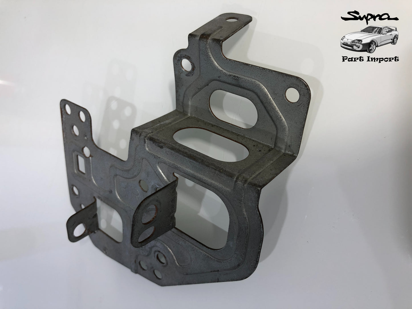 JZA80 Supra S1/S2 RHD OEM Radio Bracket Set (2 pc.) (86212-14210 + 86211-14250)